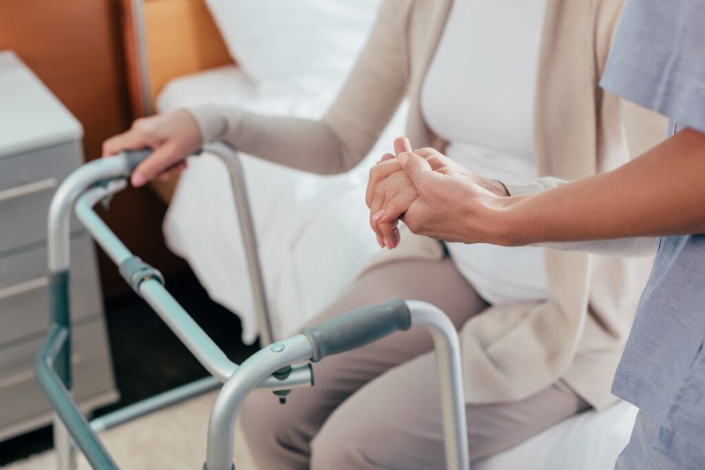 A lady on wheel chair due to injuries